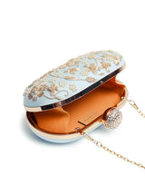 Hand-embroidered Baiza Zardozi clutch bag by The Tan Clan with intricate traditional embroidery and a sleek design.