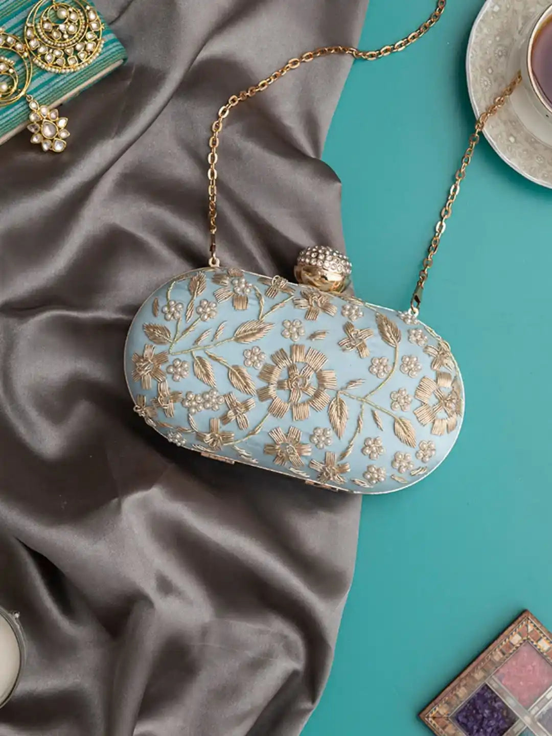 Hand-embroidered Baiza Zardozi clutch bag with intricate embroidery by The Tan Clan, featuring a stylish and elegant design.