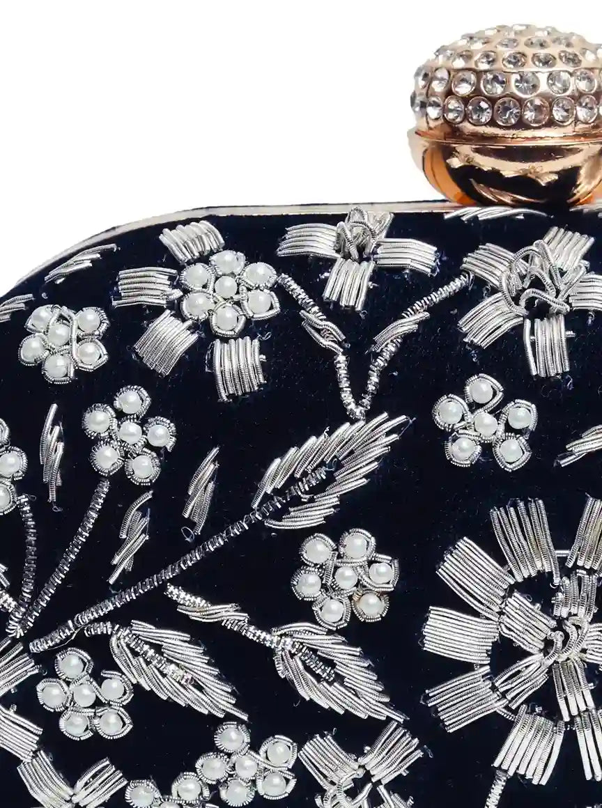Hand-embroidered Baiza Zardozi clutch by The Tan Clan featuring intricate Zardozi embroidery and elegant design.