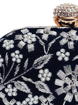 Hand-embroidered Baiza Zardozi clutch by The Tan Clan featuring intricate Zardozi embroidery and elegant design.