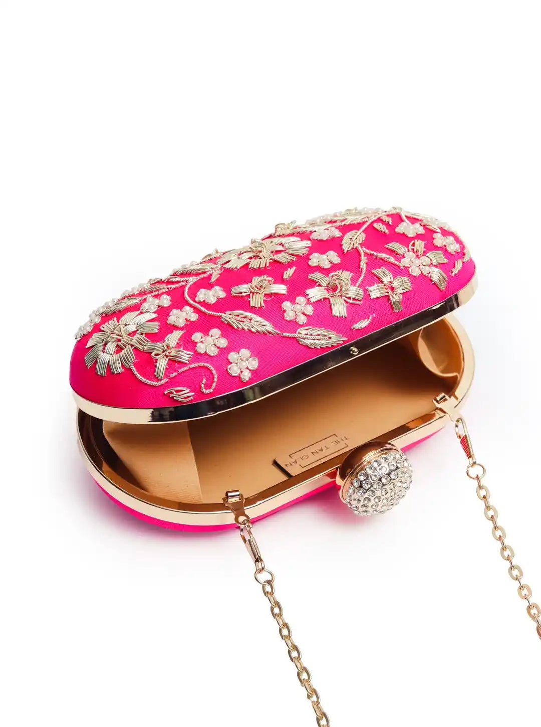 Elegant Baiza Zardozi hand-embroidered clutch by The Tan Clan featuring intricate traditional embroidery and a sleek design.