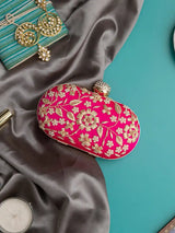 Hand-embroidered Baiza Zardozi clutch bag by The Tan Clan with intricate embroidery and elegant design.