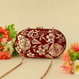 Begum Zardozi hand-embroidered clutch by The Tan Clan featuring intricate gold thread embroidery and elegant design.