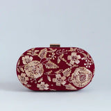 Begum Zardozi hand-embroidered clutch by The Tan Clan with intricate gold embroidery and traditional design.