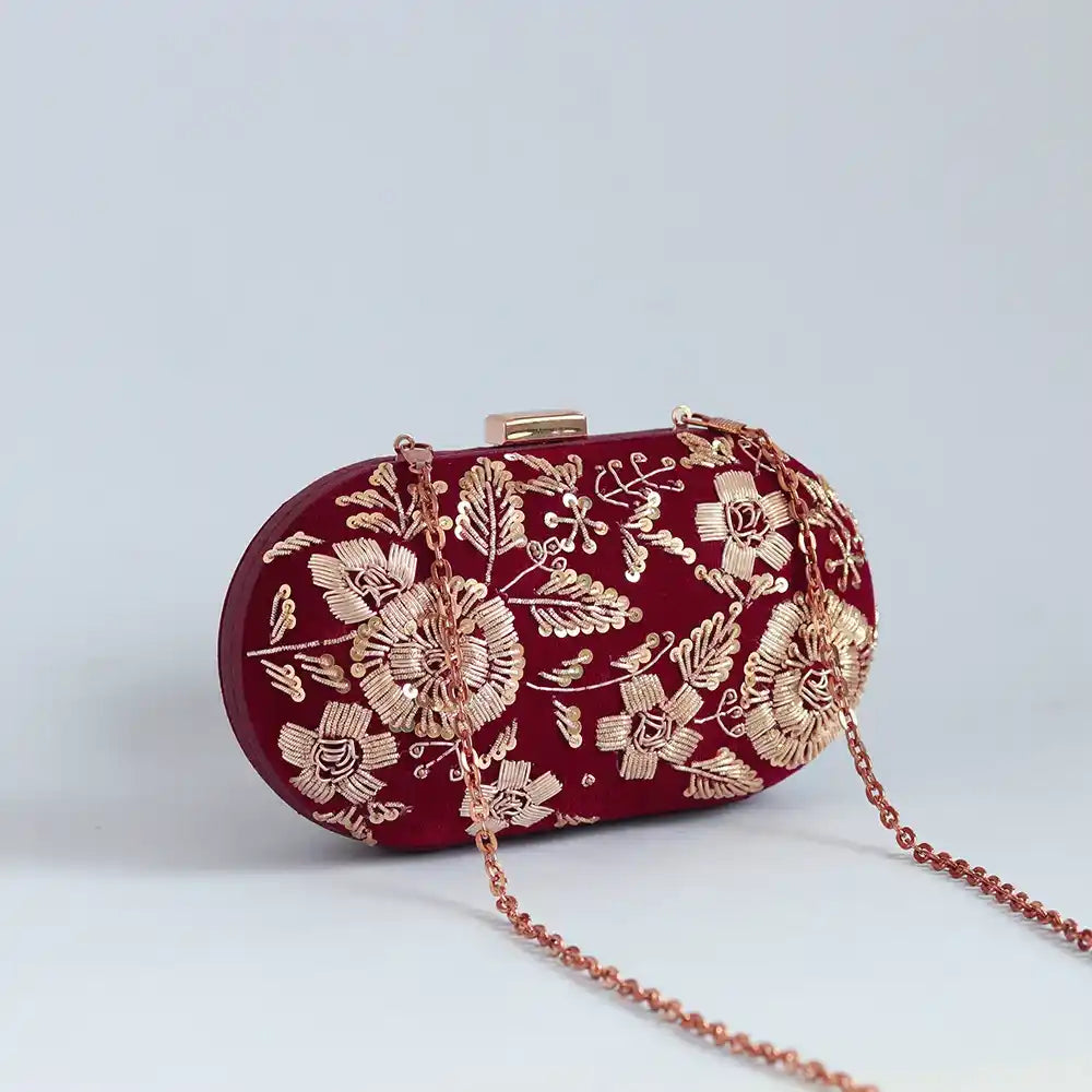 Hand-embroidered Begum Zardozi clutch bag by The Tan Clan with intricate traditional embroidery and elegant design.