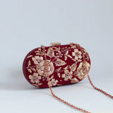Hand-embroidered Begum Zardozi clutch bag by The Tan Clan with intricate traditional embroidery and elegant design.