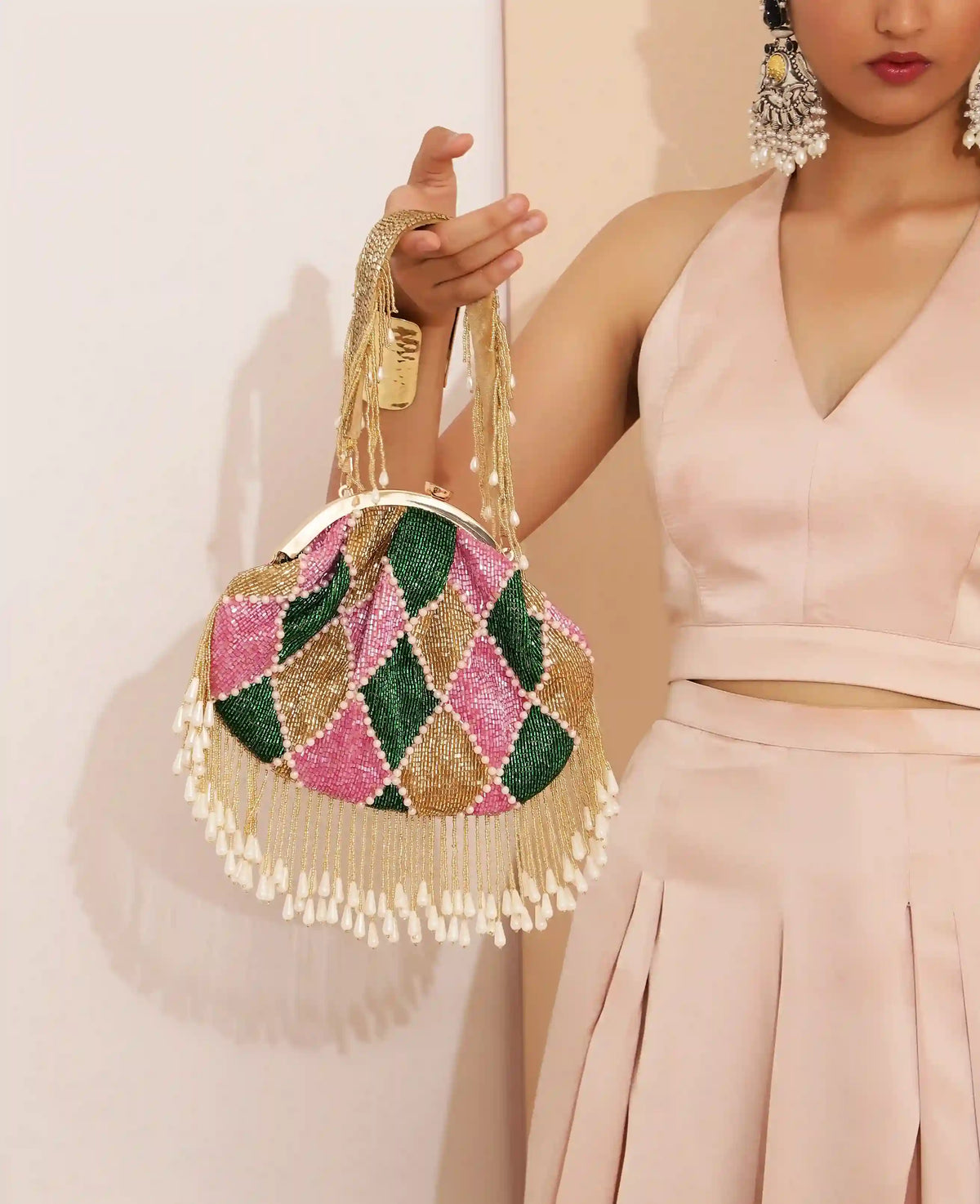 Bliss Batua Bag by The Tan Clan featuring a stylish design with a detachable handle in neutral color.