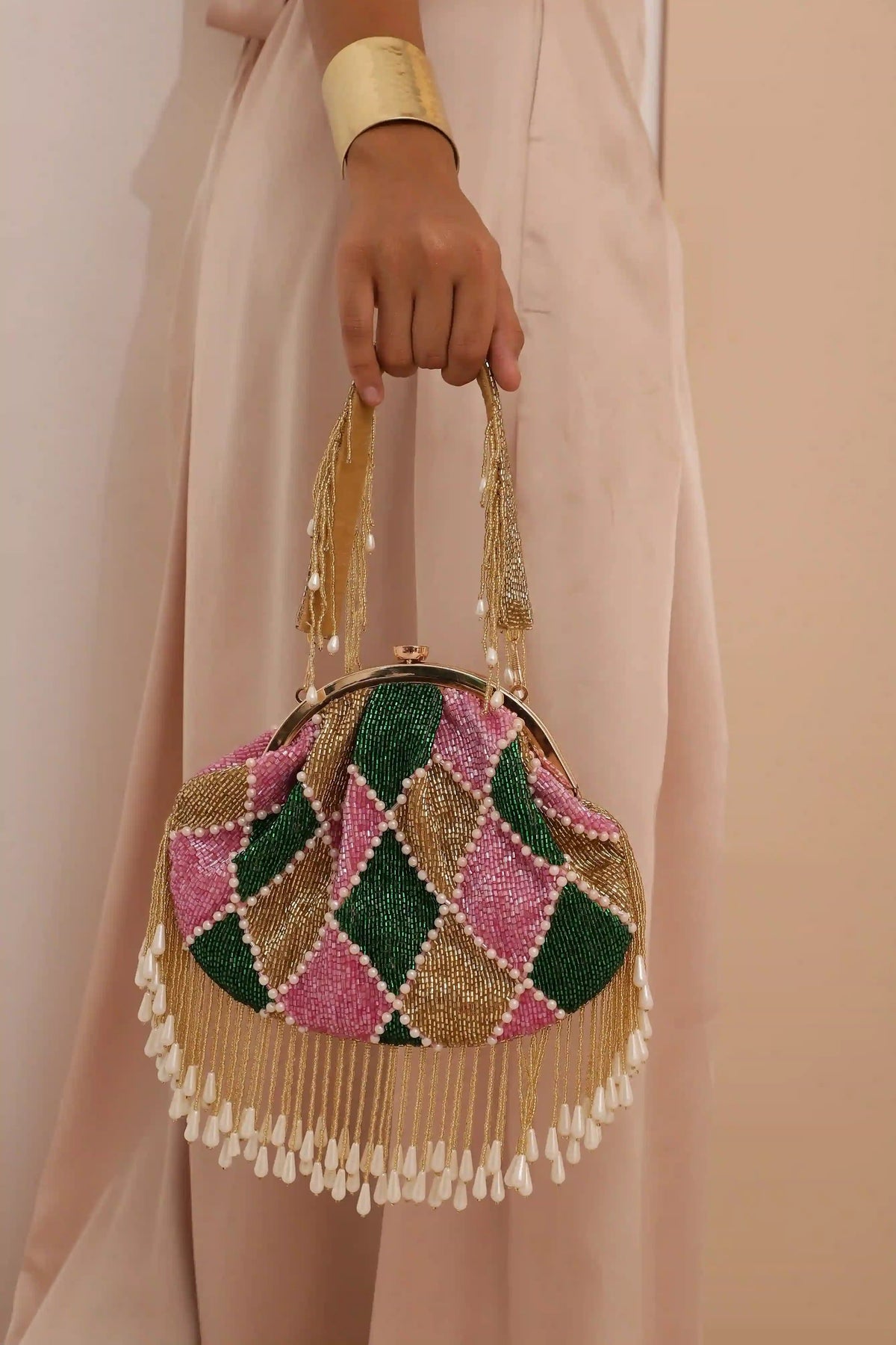 Tan Clan Bliss Batua Bag with detachable handle, stylish traditional Indian purse in rich brown leather with intricate design.