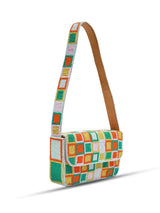 Blossom Blocks Baguette Bag with Handle by The Tan Clan, stylish woven handbag with floral pattern and top handle.
