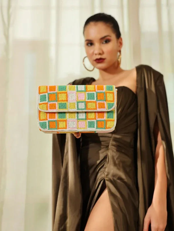 Blossom Blocks Baguette Bag with Handle by The Tan Clan, stylish woven handbag with floral pattern and sturdy top handle.