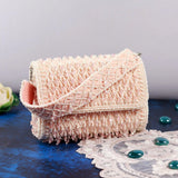 Blush flap-over bag with handle from The Tan Clan, featuring a stylish design and spacious interior for everyday use.