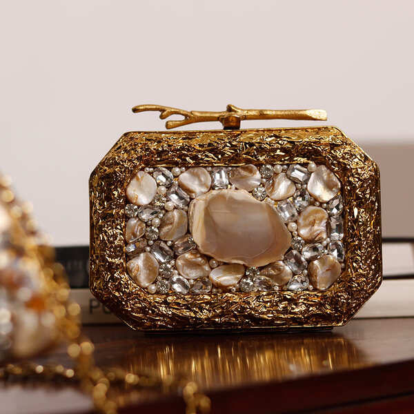 Burj embellished agate stone clutch by The Tan Clan featuring intricate design and polished agate stone surface.