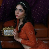 Burj embellished clutch made of agate stone by The Tan Clan, featuring intricate design and polished surface.