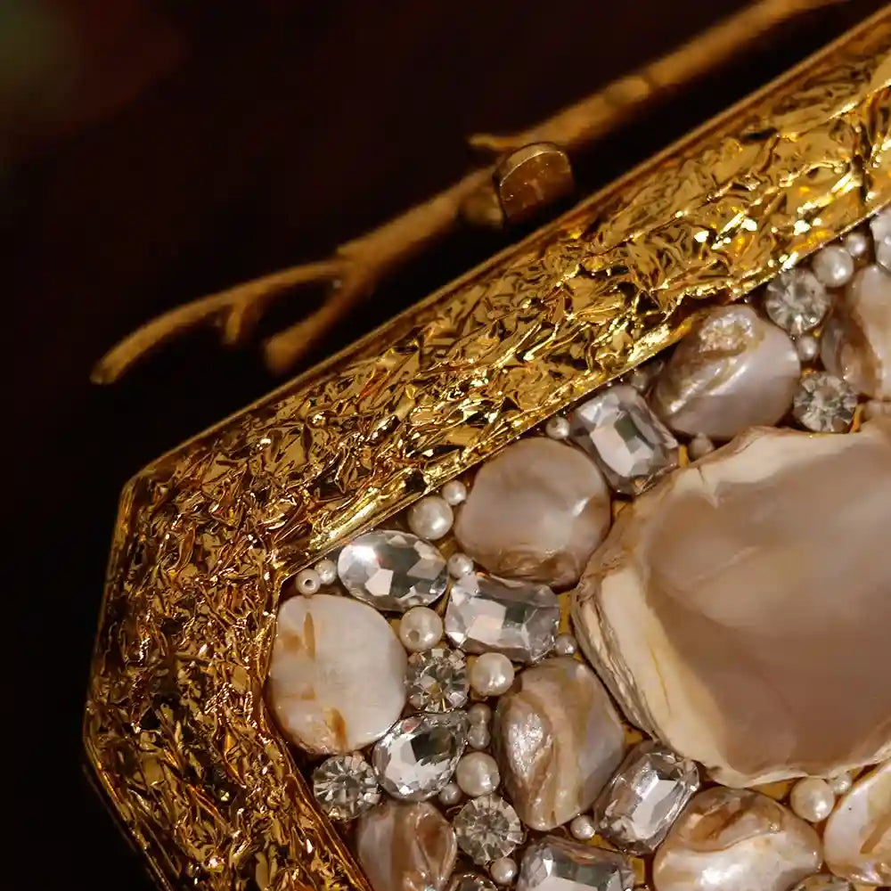 Burj embellished agate stone clutch by The Tan Clan featuring intricate designs and a polished, elegant finish.
