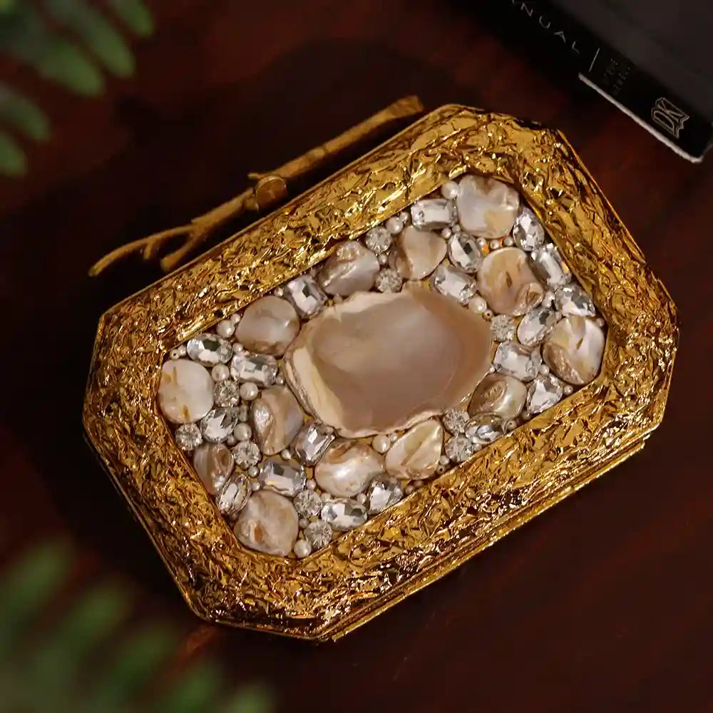Burj embellished agate stone clutch by The Tan Clan featuring intricate design and elegant polished agate stone surface.