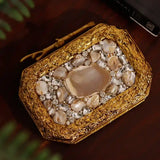 Burj embellished agate stone clutch by The Tan Clan featuring intricate design and elegant polished agate stone surface.