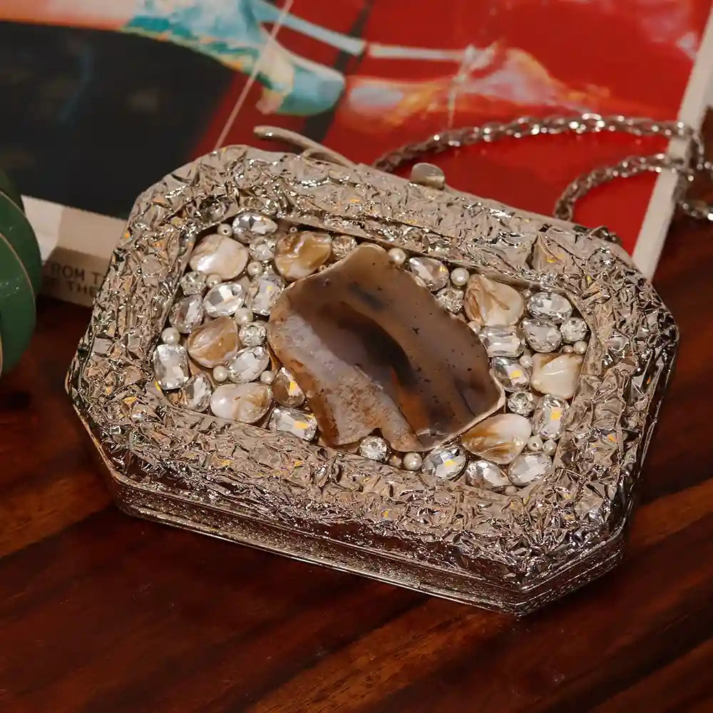 Burj embellished agate stone clutch by The Tan Clan featuring intricate design and polished agate surface.