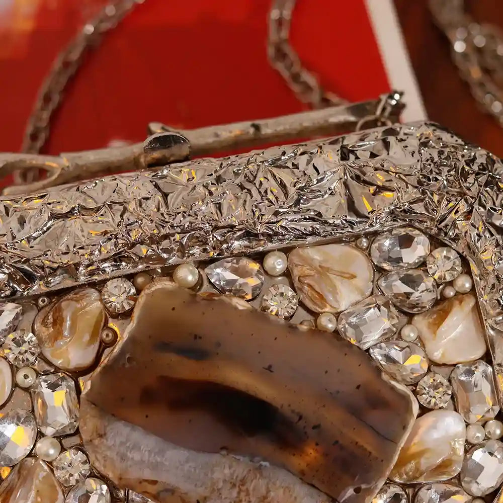 Burj embellished agate stone clutch by The Tan Clan featuring a polished agate surface and elegant design.