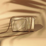 Bushra 3D Mother of Pearl clutch by The Tan Clan, showcasing a shimmering, intricate pearl design on a sleek, elegant evening bag.