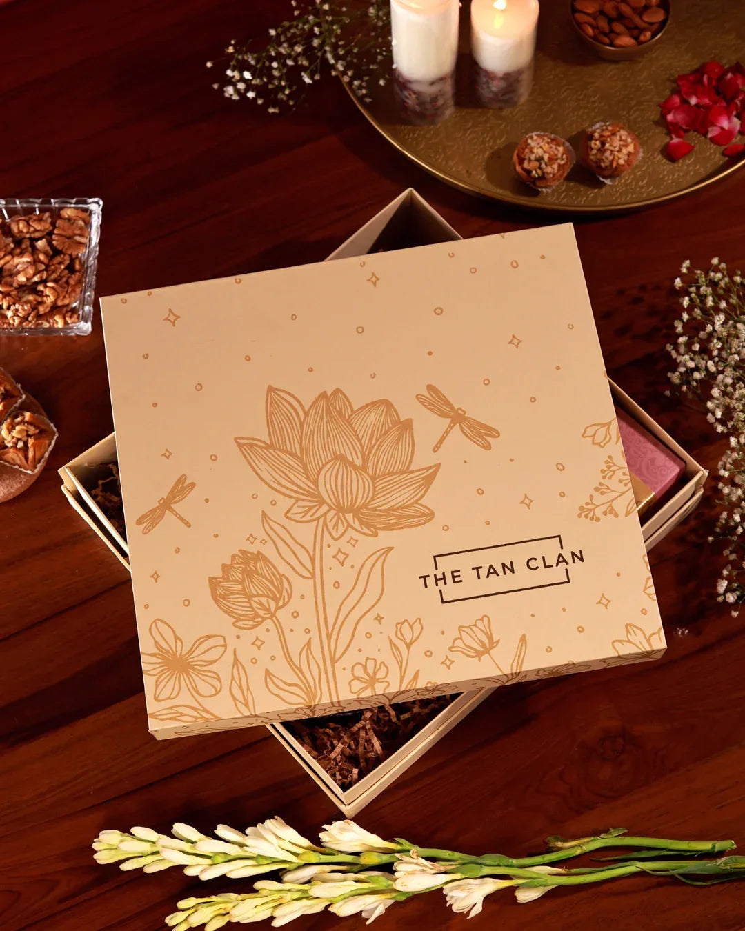 Floral Grace Hamper by The Tan Clan featuring vibrant poppy flowers and elegant gift items in a decorative basket.