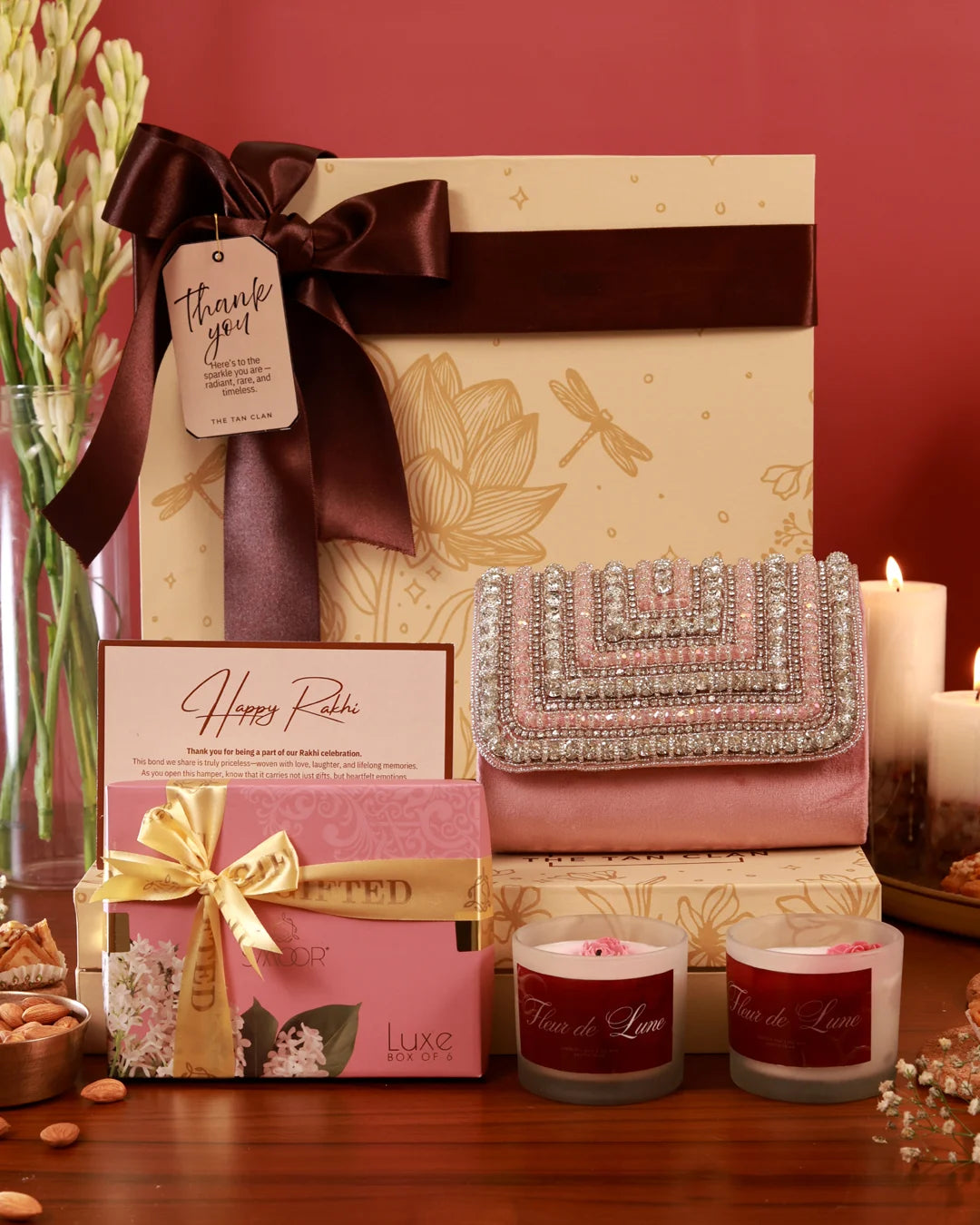 Celebrate Her Hamper by The Tan Clan featuring luxurious skincare, chocolates, and pampering items in an elegant gift box.