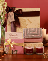 Celebrate Her Hamper by The Tan Clan featuring luxurious skincare, chocolates, and pampering items in an elegant gift box.