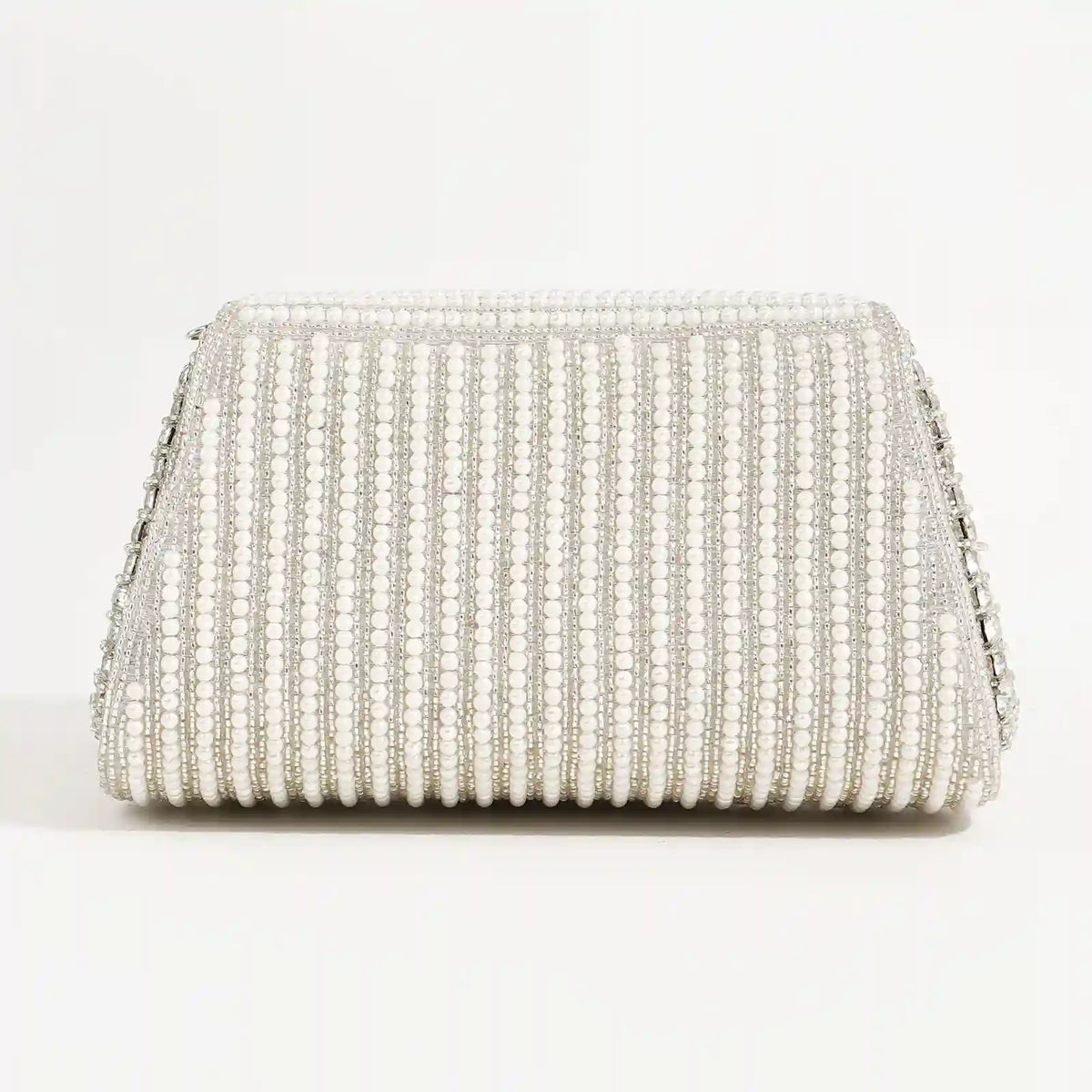 Chloe flap-over bag with handle by The Tan Clan, featuring a stylish design and secure flap closure in a versatile style.