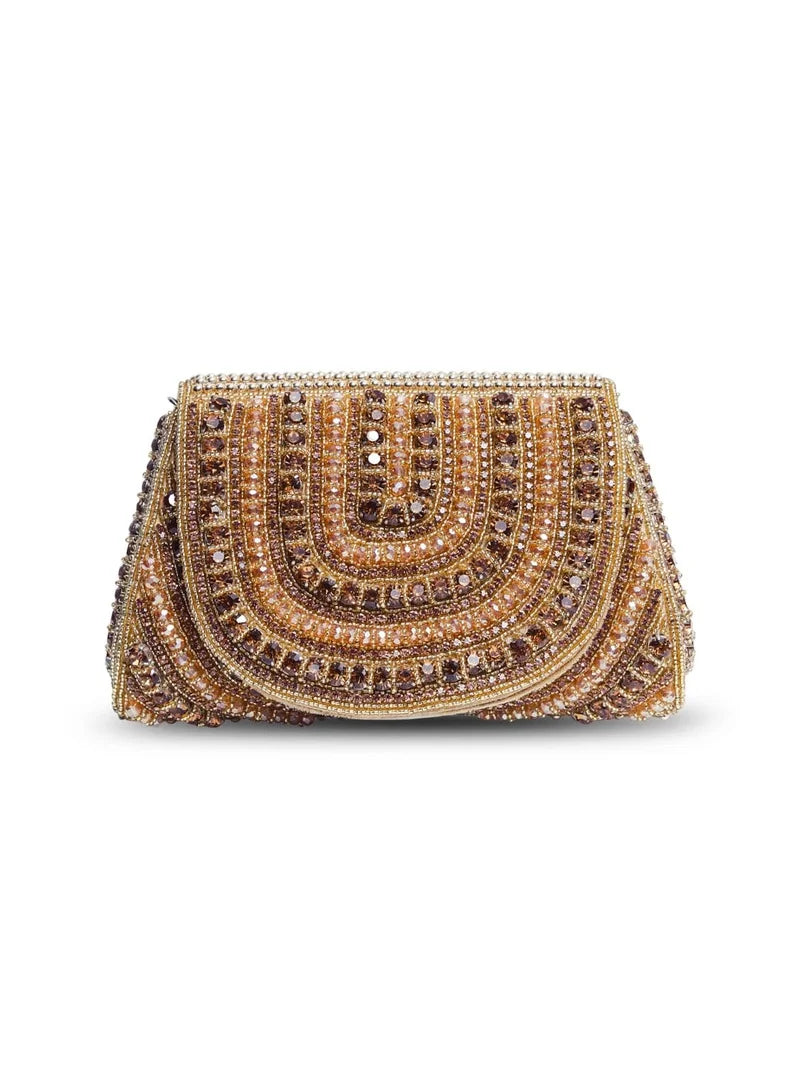 Chloe gold flap-over bag with handle from The Tan Clan, featuring a sleek design and structured silhouette.