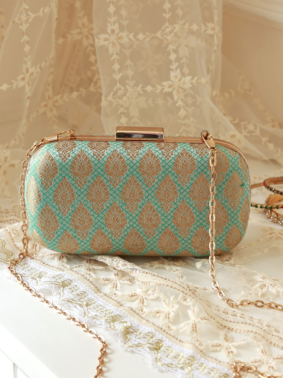 Classic green long clutch by The Tan Clan, featuring a sleek design with a zipper closure and elegant finish.