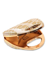 Coral Arc Beige Clutch by The Tan Clan showing a stylish beige clutch with coral accents and sleek design.