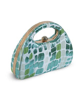 Coral Arc Green Clutch by The Tan Clan featuring a sleek design and vibrant color, ideal for stylish evening accessories.