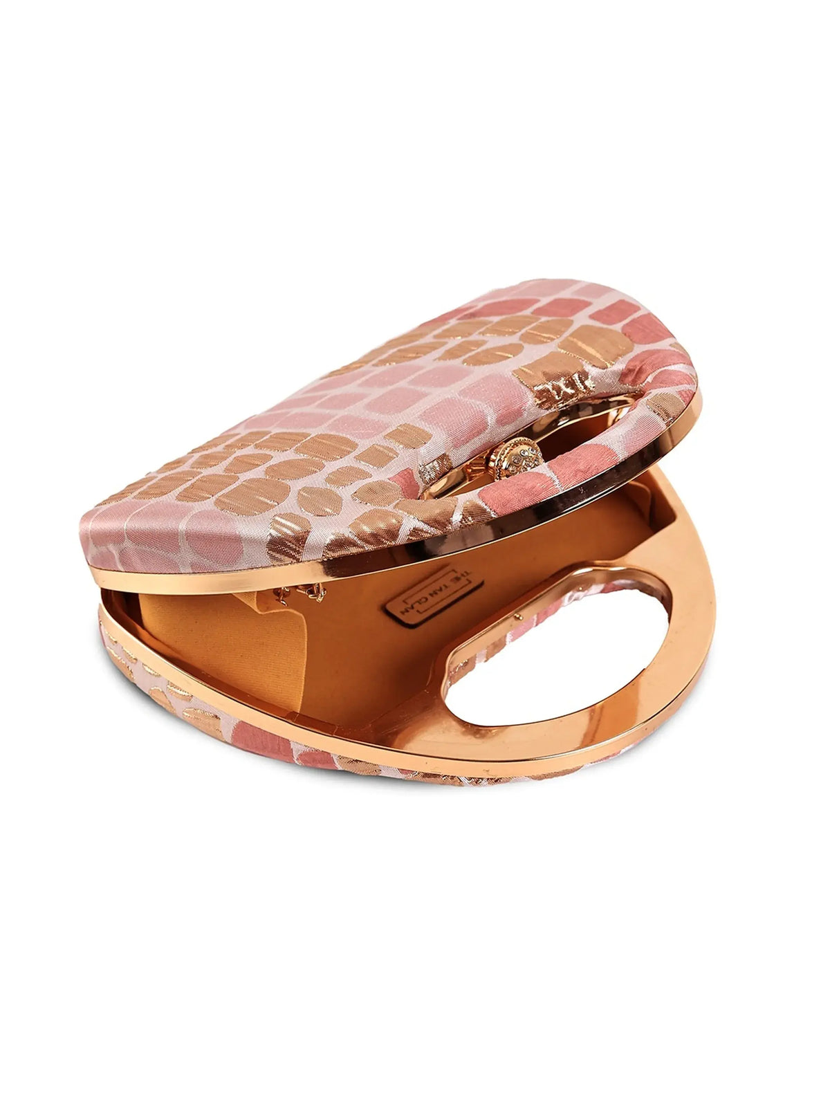 Coral Arc Peach Clutch by The Tan Clan featuring a sleek design with a curved shape and elegant strap.