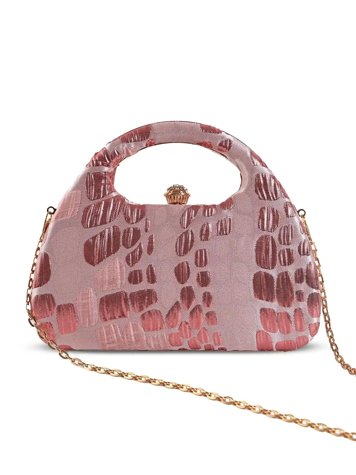 Pink Coral Arc clutch bag by The Tan Clan featuring a sleek, curved design and compact size for stylish accessorizing.