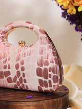 Coral Arc Pink Clutch by The Tan Clan featuring a sleek design and vibrant coral pink color for stylish accessorizing.