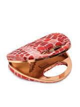 Coral Arc Red Clutch by The Tan Clan featuring a sleek, curved design and vibrant red color, perfect for evening accessories.