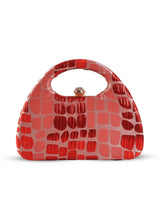 Coral Arc Red Clutch by The Tan Clan with sleek design and gold-tone clasp, perfect for evening or special occasions.