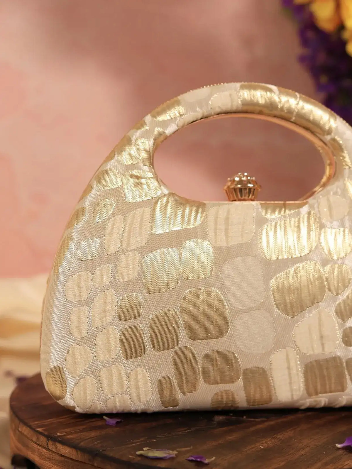Coral Arc beige clutch by The Tan Clan, elegant handbag with sleek design and neutral tones, perfect for special occasions.