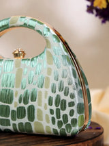 Green Coral Arc clutch bag by The Tan Clan, featuring a stylish design perfect for weddings and special occasions.