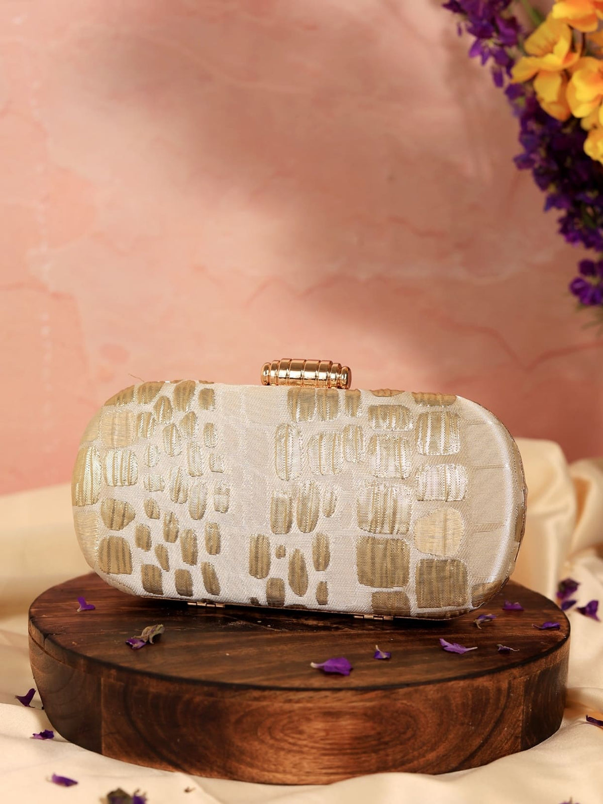 Beige coral long clutch by The Tan Clan with a sleek, minimalist design, perfect for elegant occasions.