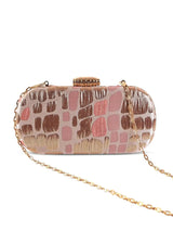 Coral long peach clutch by The Tan Clan featuring a sleek design and elegant finish, perfect for evening or special occasions.