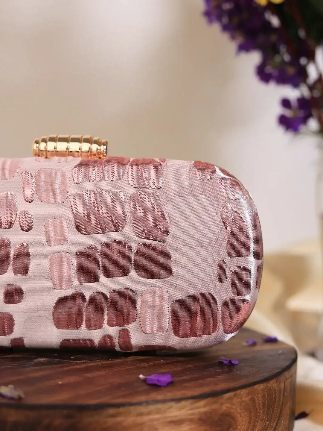 Pink coral long clutch bag by The Tan Clan with a sleek, elegant design and a smooth fabric finish.