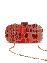 Coral long red clutch bag by The Tan Clan, featuring a sleek design and elegant finish for stylish occasions.