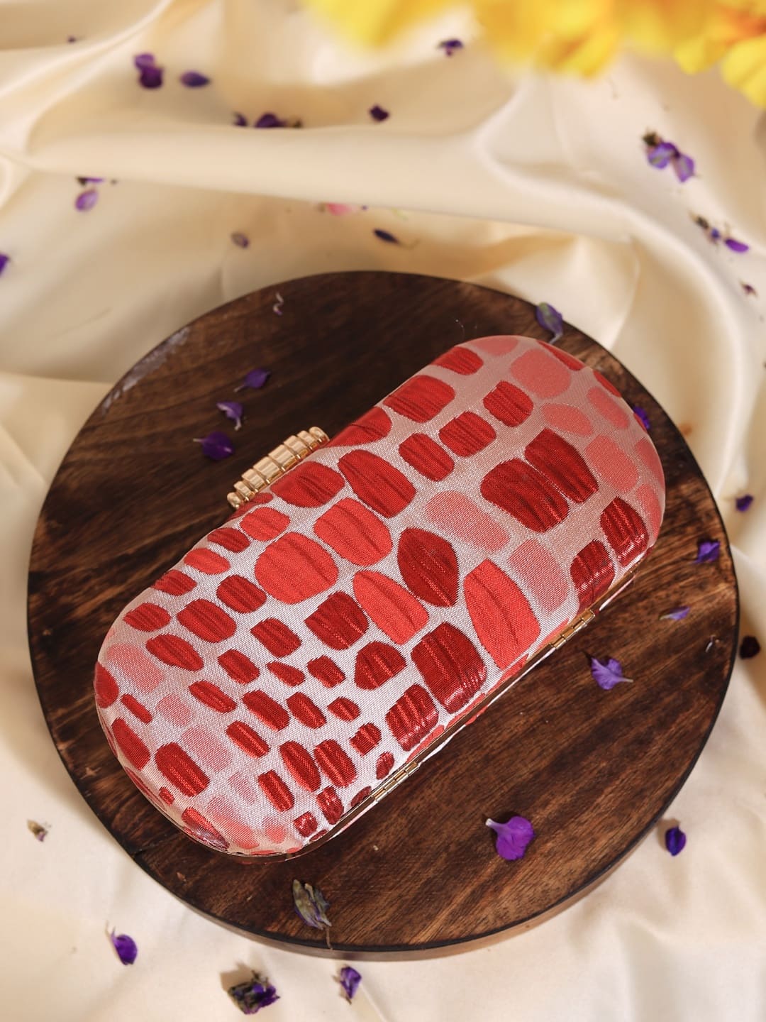 Coral long red clutch by The Tan Clan with sleek design and gold-tone clasp, perfect for evening or special occasions.