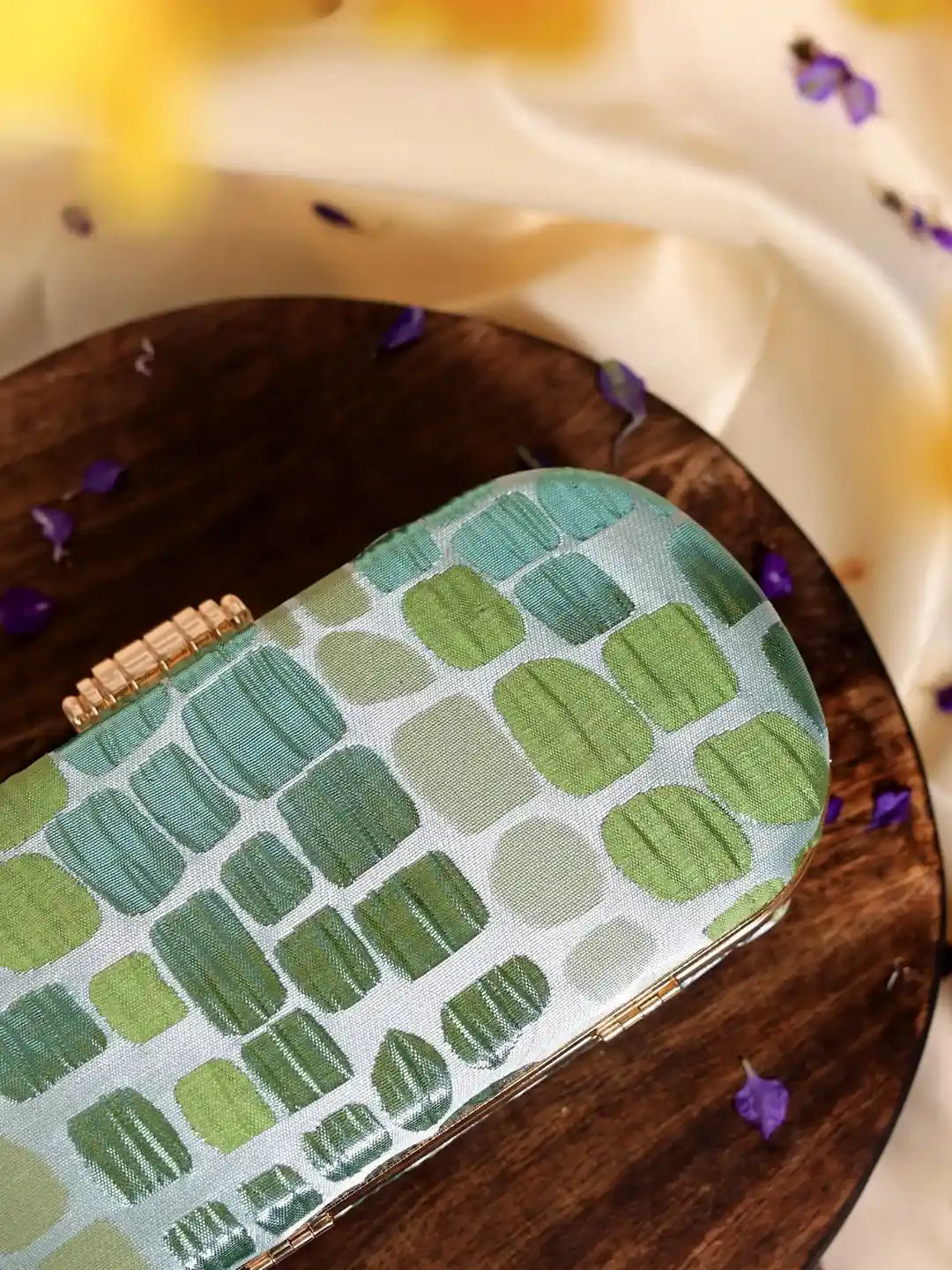 Coral long green clutch bag by The Tan Clan with a sleek design, perfect for wedding favors or elegant occasions.