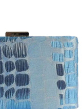 Coral Sleek Blue Clutch by The Tan Clan, featuring a stylish compact design with a smooth finish and elegant closure.