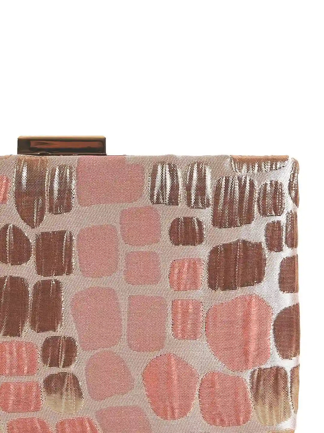 Coral Sleek Peach Clutch by The Tan Clan with a smooth, compact design and elegant gold clasp on a neutral background.