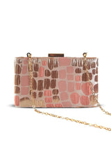 Coral sleek peach clutch bag by The Tan Clan, featuring a compact design and stylish finish for elegant accessories.
