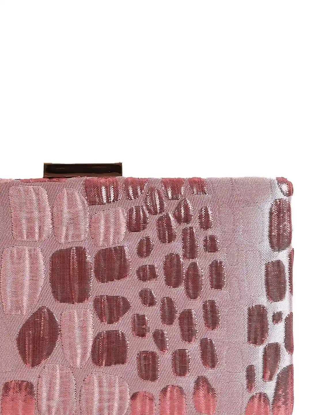 Coral pink sleek clutch bag by The Tan Clan, with a smooth finish and compact design, perfect for evening or special occasions.