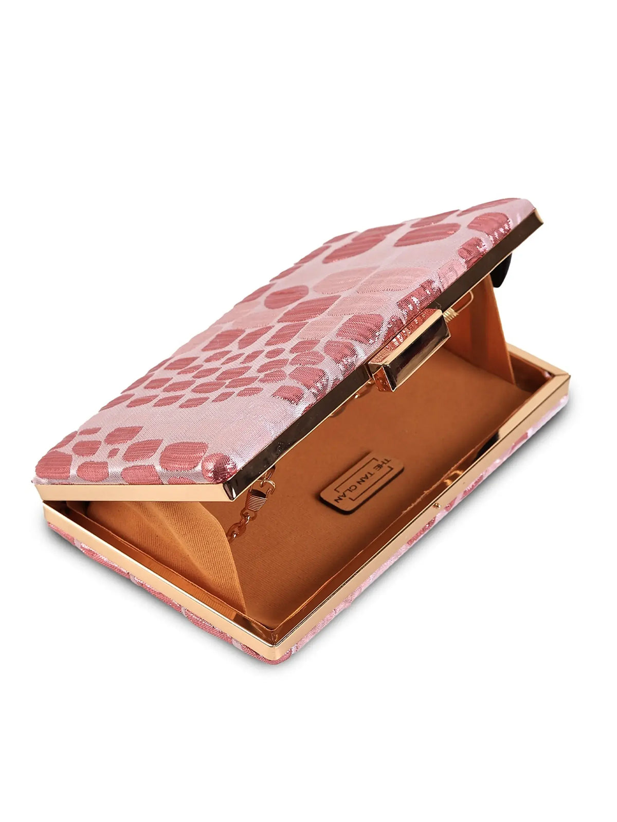Coral sleek pink clutch purse from The Tan Clan with a smooth finish and compact design, perfect for evening accessories.
