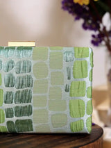 Coral Sleek Green Clutch by The Tan Clan, elegant and compact accessory with a smooth finish, perfect for special occasions.